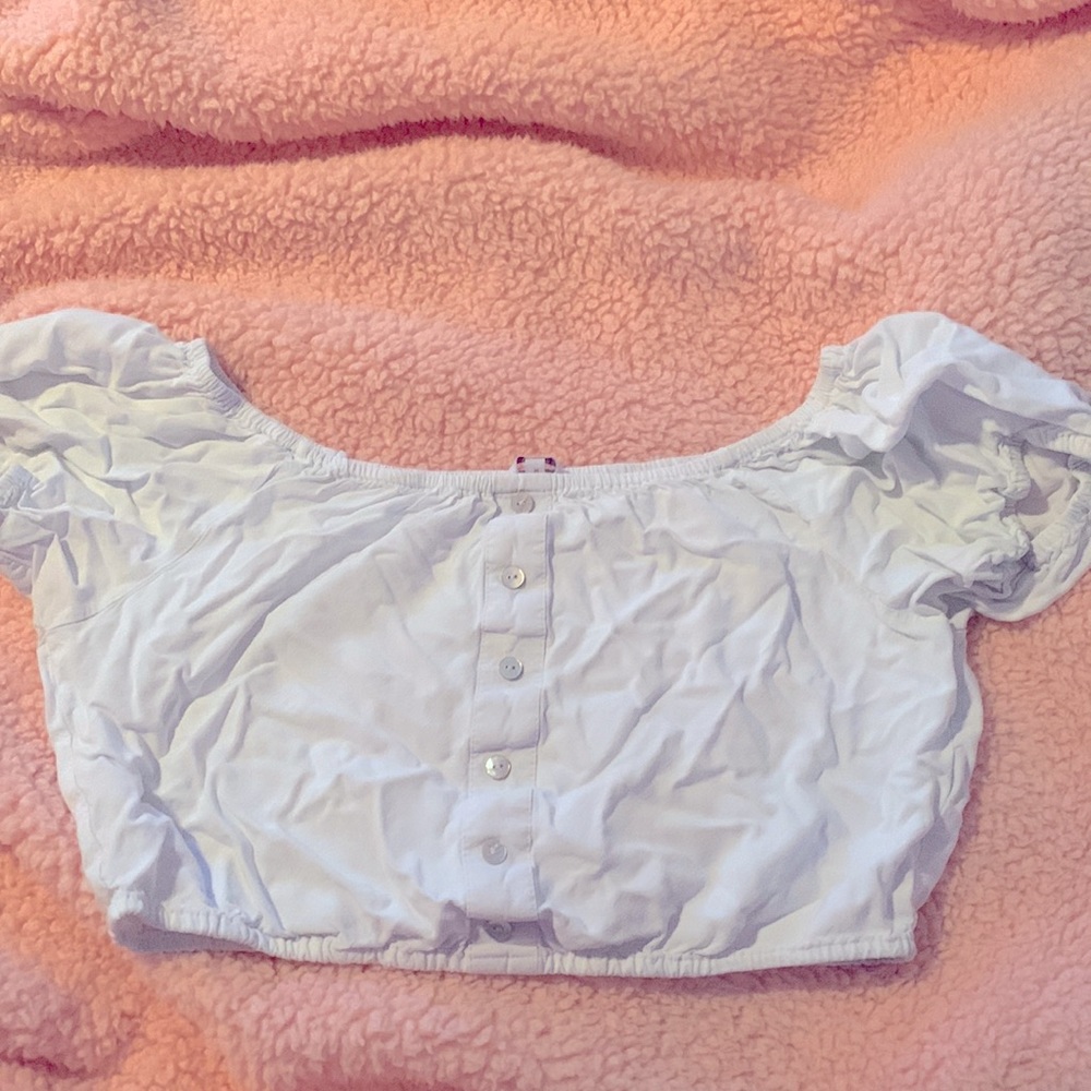 White off the shoulder crop top my chest got too big for it